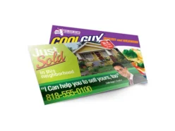 Custom printed postcards displayed for direct-mail marketing