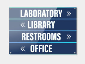 Custom printed PVC signs displayed in a modern retail interior