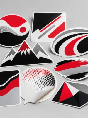 Assortment of custom printed vinyl decals and contour-cut stickers