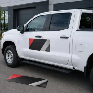 Custom magnetic vehicle sign installed on the door of a white work pickup truck