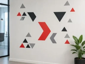 Custom red black and gray geometric wall decals installed in a modern office