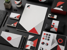 Professional brand identity presentation with stationery color swatches and packaging