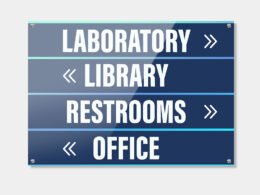 Custom printed PVC signs displayed in a modern retail interior
